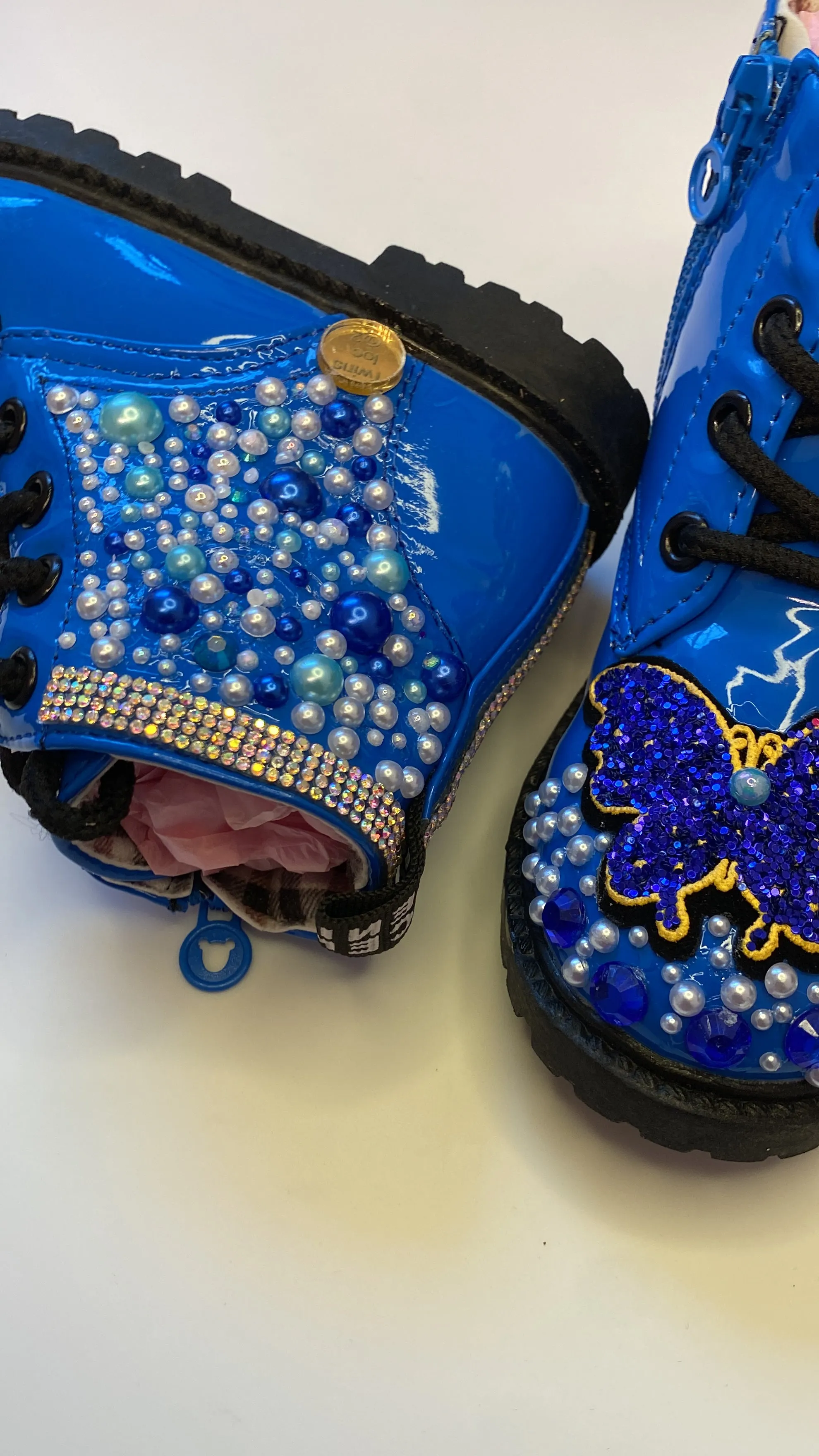 THE BLUE BUTTERFLY ON BLUE BOOTS