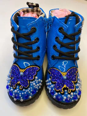 THE BLUE BUTTERFLY ON BLUE BOOTS